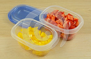 Chopped red and yellow bell peppers photo