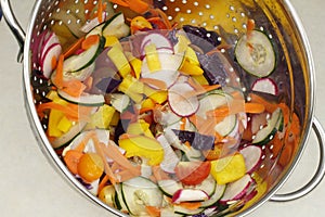 Chopped Salad Vegetables Mix in a Colander