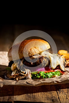 Chopped and smash cheeseburger with sautÃ©ed mushrooms photo