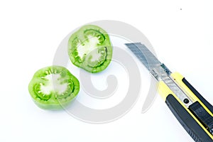 Chopped tomato on white background.with a knife