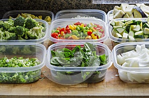 Chopped Vegetables in Plastic Storage Containers photo