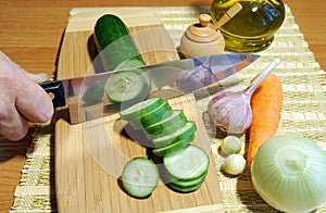 Chopping cucumber