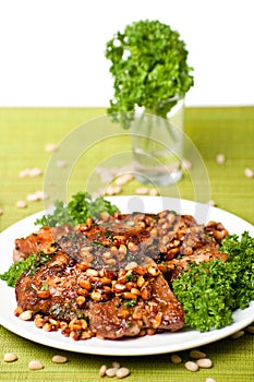 Chops from pork with cedar nutlets