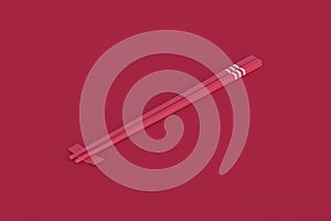 Chopstick of magenta color on red background