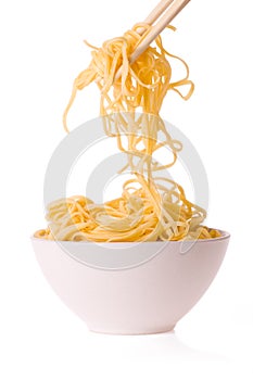 Chopsticks, bowl and noodles