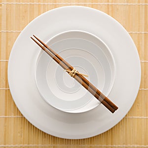 Chopsticks With Empty Bowl and Plate