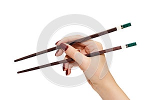 Chopsticks in a hand