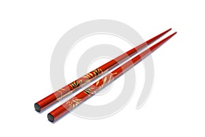 Chopsticks on white background with selective focus photo