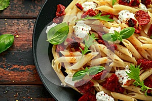 Chorizo, Penne pasta with creamy ricotta cheese and greens