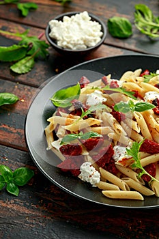 Chorizo, Penne pasta with creamy ricotta cheese and greens