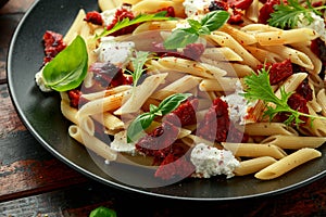 Chorizo, Penne pasta with creamy ricotta cheese and greens