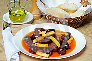 Chorizo and potatoes in oil tapas.