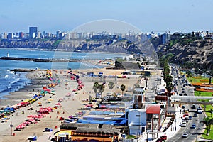 chorrillos peru-aerial view of the beach-agua dulce pier plaza with in pacific ocean with umbrellas photo