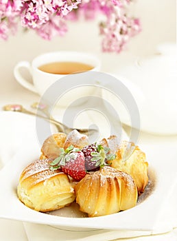 choux pastry eclairs with cream photo