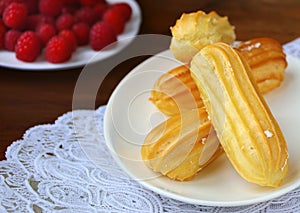 choux pastry eclairs with cream photo
