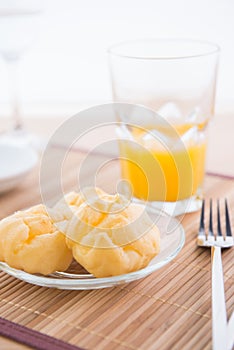 Choux pastry and orange juice