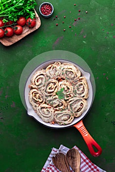 Choux Pastry Rolls with Minced Meat in a Pan