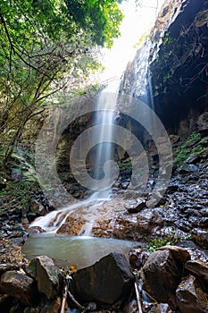 Chrey Thom waterfall on a sunny day in Saen Monorom, Cambodia