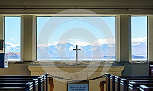 Inside the Church of the Good Shepherd with mountain view background, lake Tekapo, New Zealand