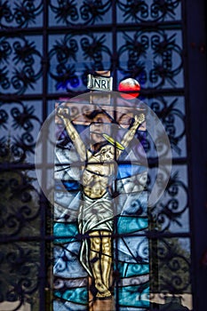 The christ on the cross on the stained glass window