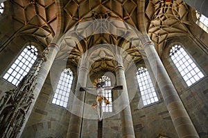 Christ Crucified and vertical view to Gothic chor vault of Saint Michaels Church, Schwabisch Hall, Baden-Wurttemberg, Germany
