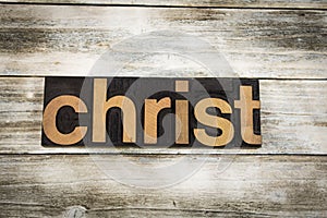 Christ Letterpress Word on Wooden Background