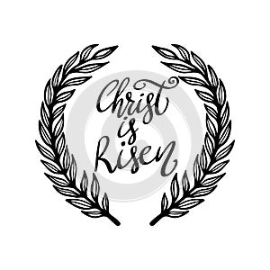 Christ is risen. Lettering phrase with wreath isolated on white