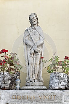 The Christ statue on Sts. Peter and Paul Cathedral in Kamianets-Podilskyi, Ukrain photo