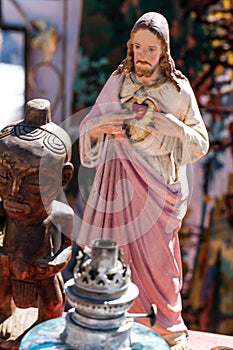 Christ statue and wooden carved African statue for religion collections