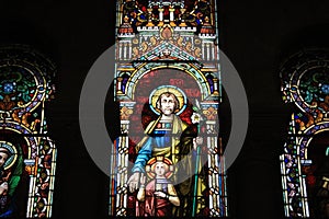 Christian Art in Almudena cathedral in Madrid, stained glass medieval historical religious artwork christianity