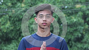 Christian Asian Male Teen Boy Sign Of Cross