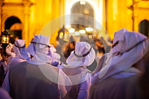 Christian brethren during the traditional Good Friday procession, Leonforte