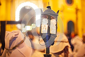 Christian brethren during the traditional Good Friday procession, Leonforte