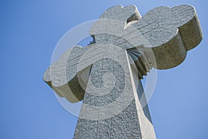 Christian cross on blue sky background