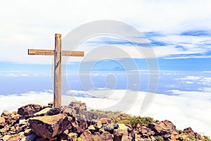 Christian cross on mountain top