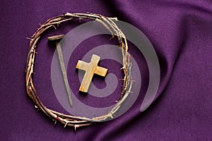 Christian cross, nail and the crown of thorns of Jesus Christ