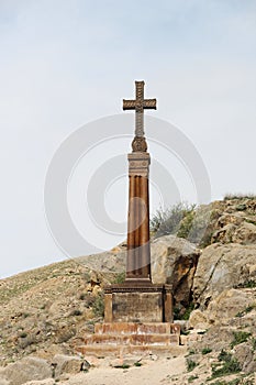 Christian cross near ancient monastery Khor Virap photo