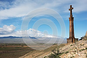 Christian cross near ancient monastery Khor Virap photo