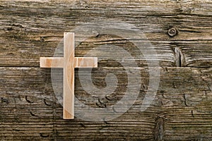 Christian cross old wood on wooden background christianity