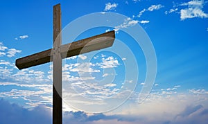 Christian cross over beautiful sky background