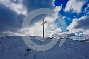 Christian Cross silhouette sunlight clouds sky