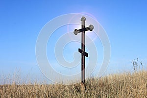 Christian cross on sky background