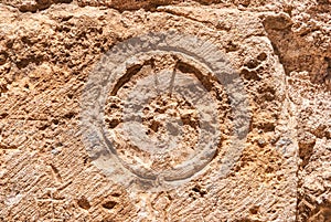 Christian cross of stone wall of the Church of the Holy Sepulchre