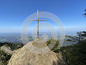 Christian crucifix on the hills and lookouts over the Eigental alpine valley, Einsiedeln - Canton of Schwyz, Eigenthal