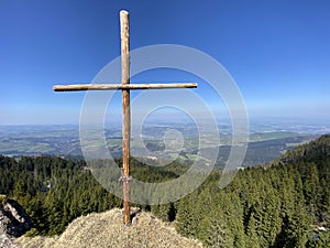 Christian crucifix on the hills and lookouts over the Eigental alpine valley, Einsiedeln - Canton of Schwyz, Eigenthal