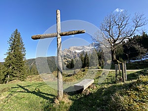 Christian crucifix on the hills and lookouts over the Eigental alpine valley, Einsiedeln - Canton of Schwyz, Eigenthal