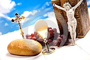 Christian holy communion, bright background, saturated concept