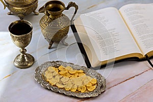 Christian Holy Communion with unleavened bread chalice of wine symbols of Jesus Christ