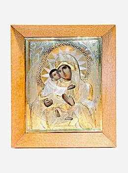 Christian icon with the face of the Vladimir Mother of God holding a baby