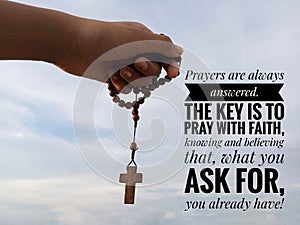 Christian inspirational words. Prayer quote. With background of young woman holding rosary on clear bright blue sky.